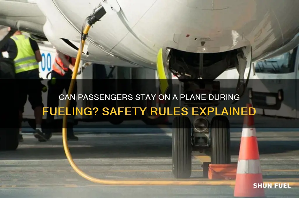 can passengers stay on a plane during fueling