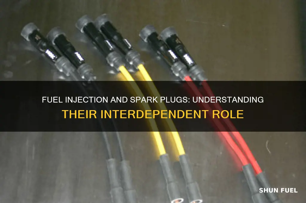does fuel injection use spark plugs