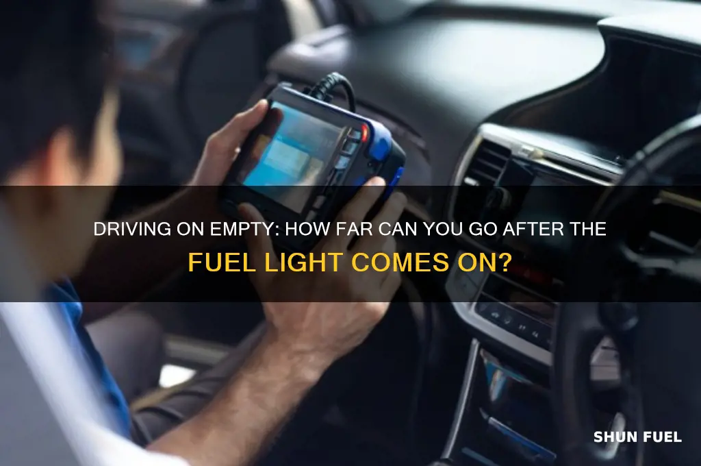 how far can i get with my fuel light on