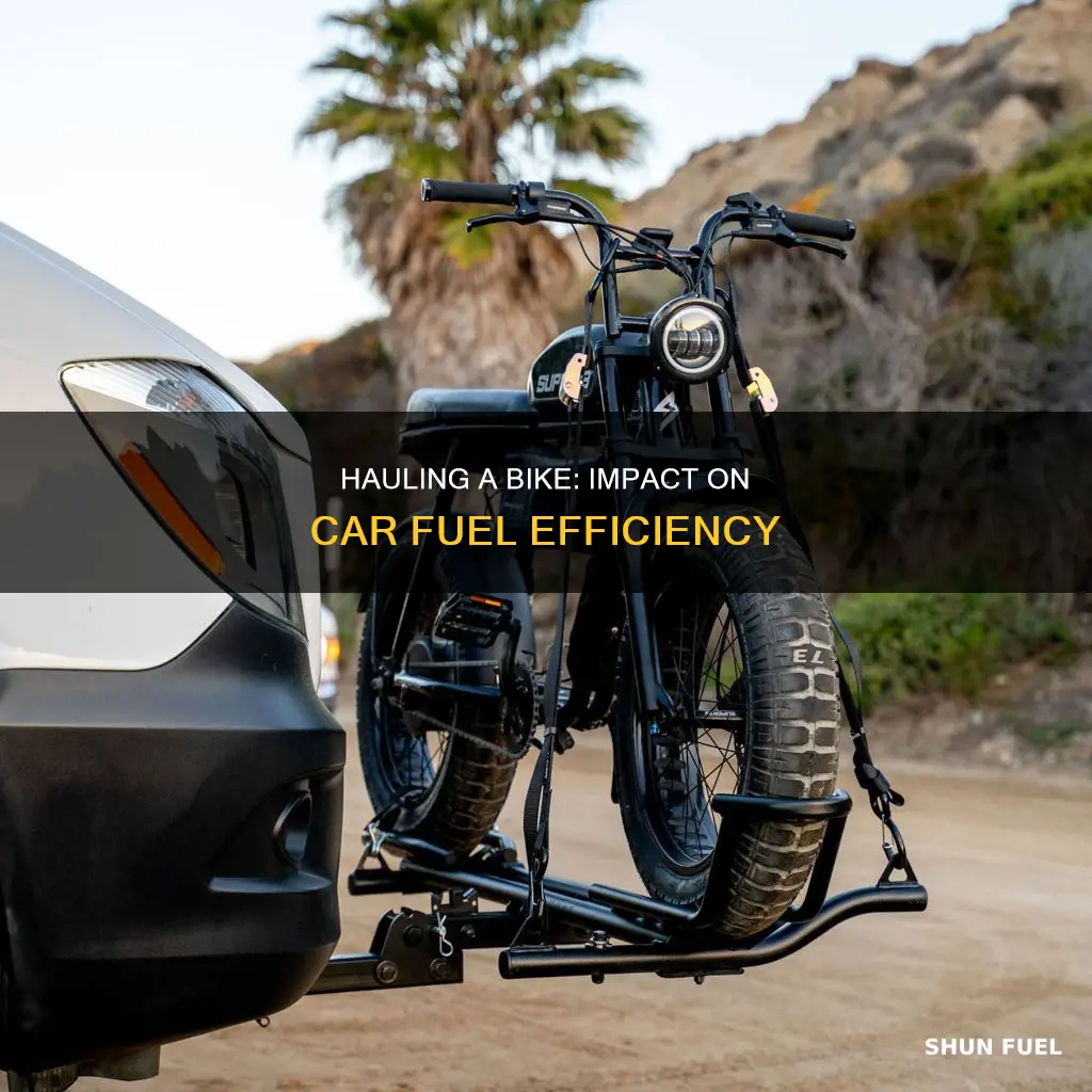 how much does having bike on car reduce fuel