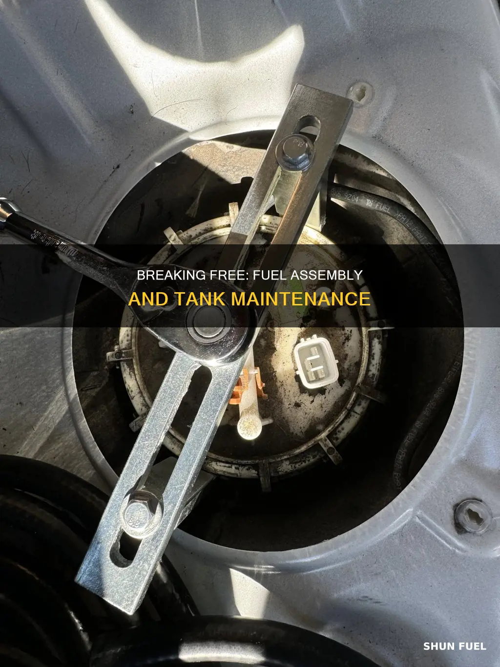 how to break free stubborn fuel assembly on fuel tank