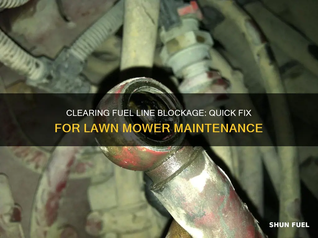 how to clear a fuel line blockage of lawn mower