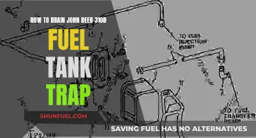 Draining the John Deere 310D: Fuel Tank Trap Guide