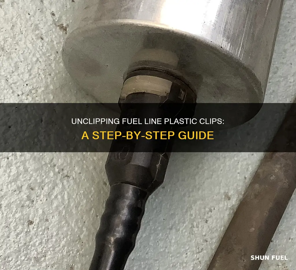 how to get fuel line plastic clips off