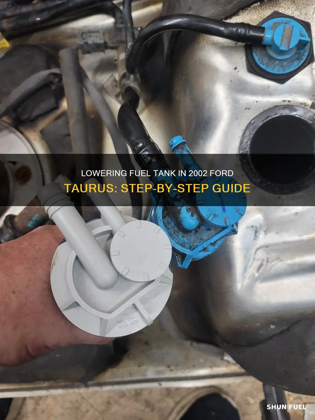 how to lower fuel tank 2002 ford taurus