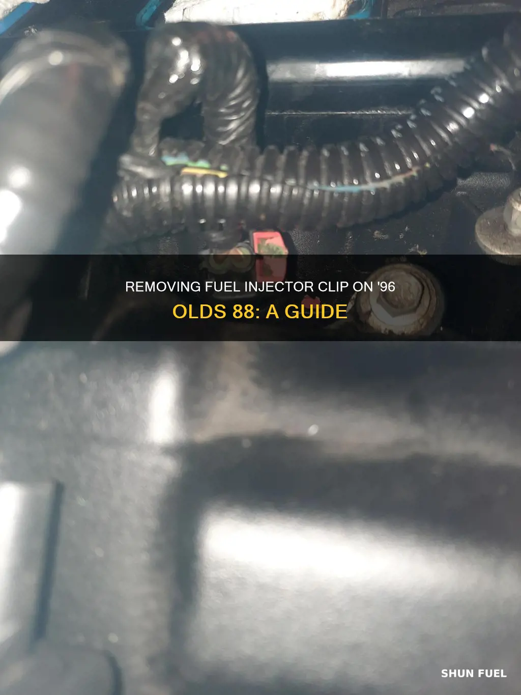 how to remove fuel injector clip on 1996 olds 88