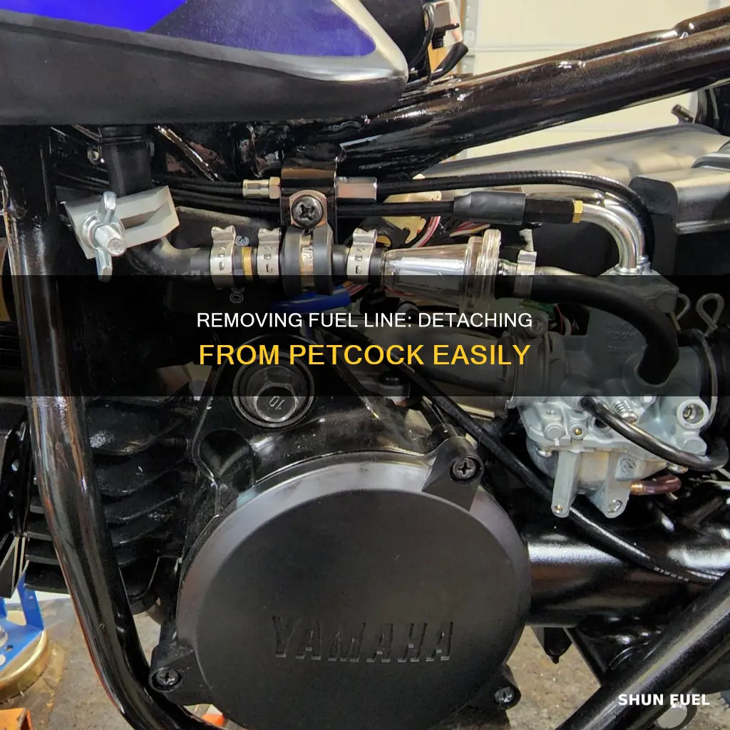 how to remove fuel line from petcock