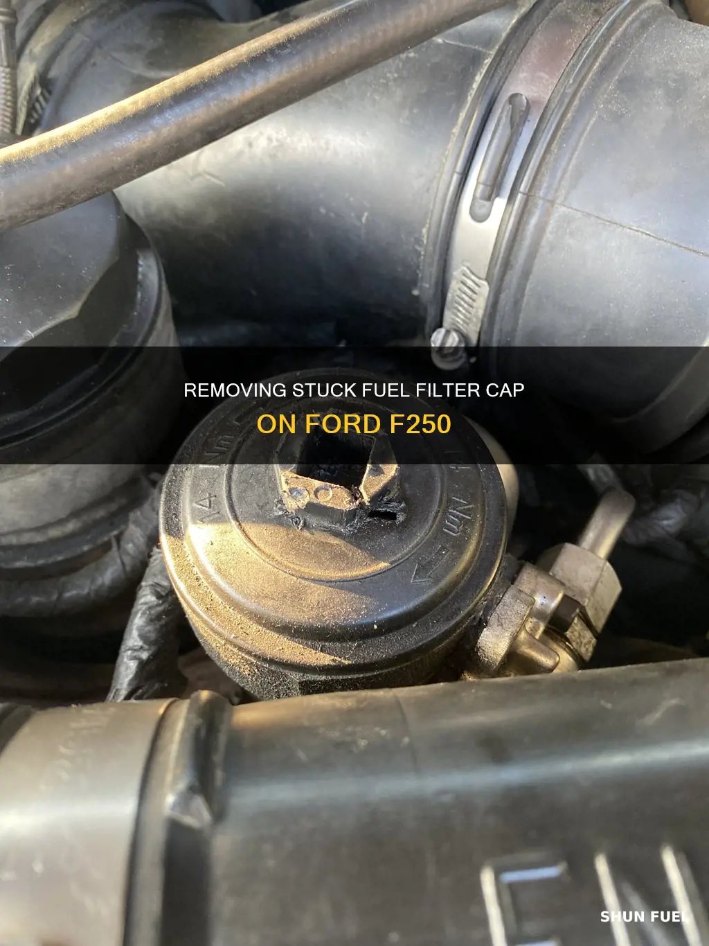 how to remove stuck fuel filter cap ford f250