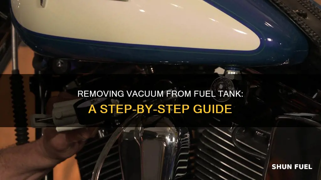 how to remove vaccuum from fuel tank