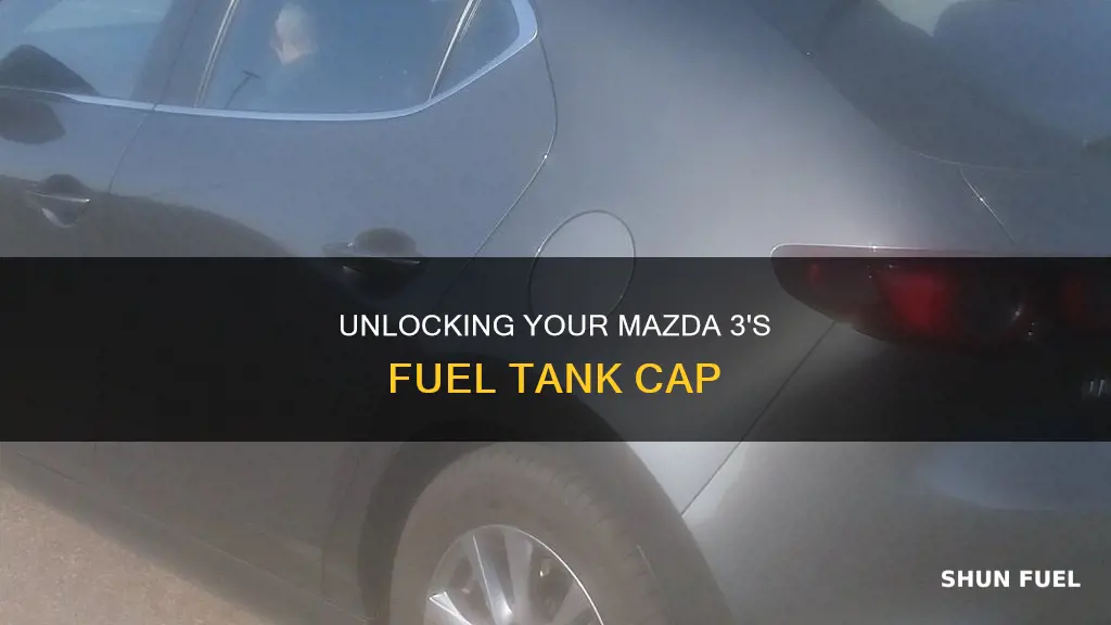 how to take cap off 2004 mazda 3 fuel tank