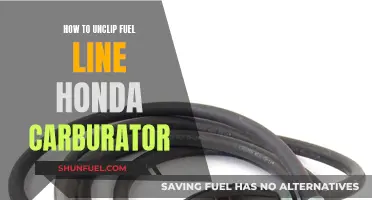 Unclipping Fuel Lines: Honda Carburetor Maintenance Guide