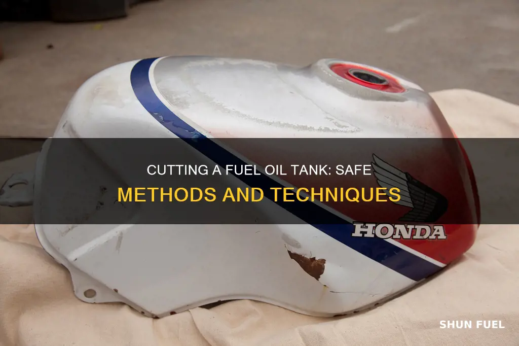 how would you cut a fuel oil tank in half