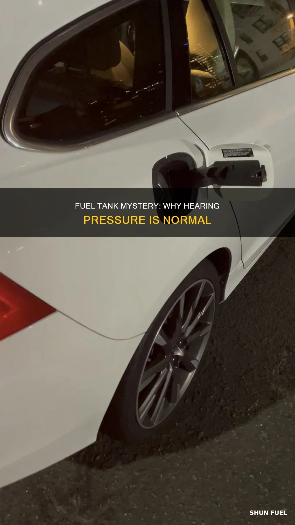 should you hear fuel tank pressurized when opening gas cap