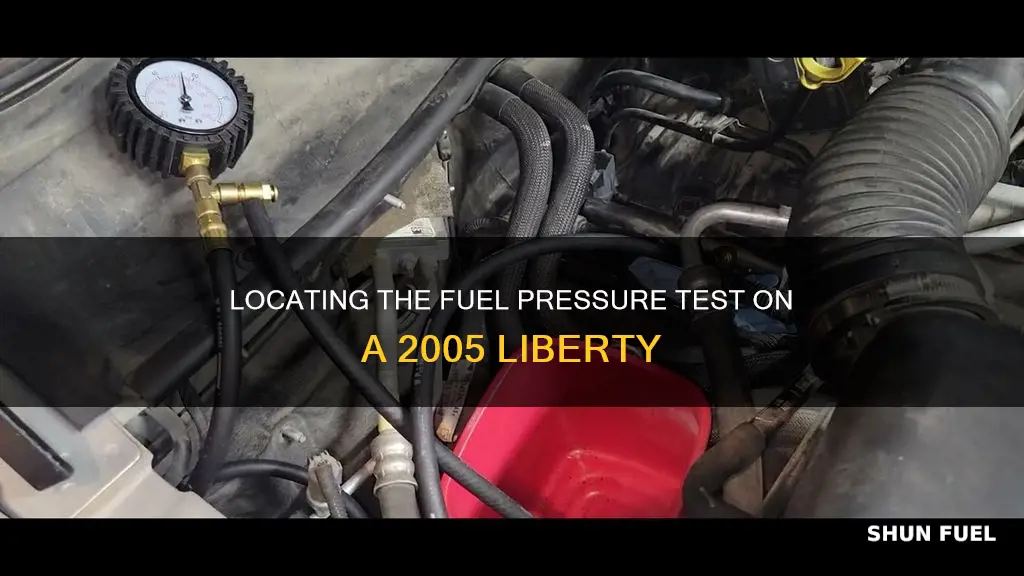 where is 05 liberty fuel pressure test located