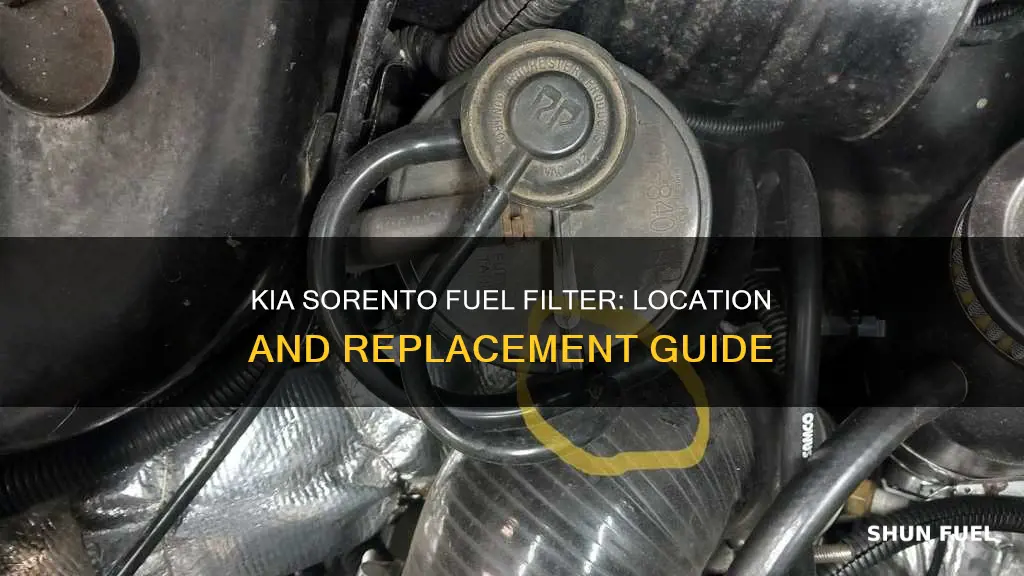 where is fuel filter located on 2004 kia sorento