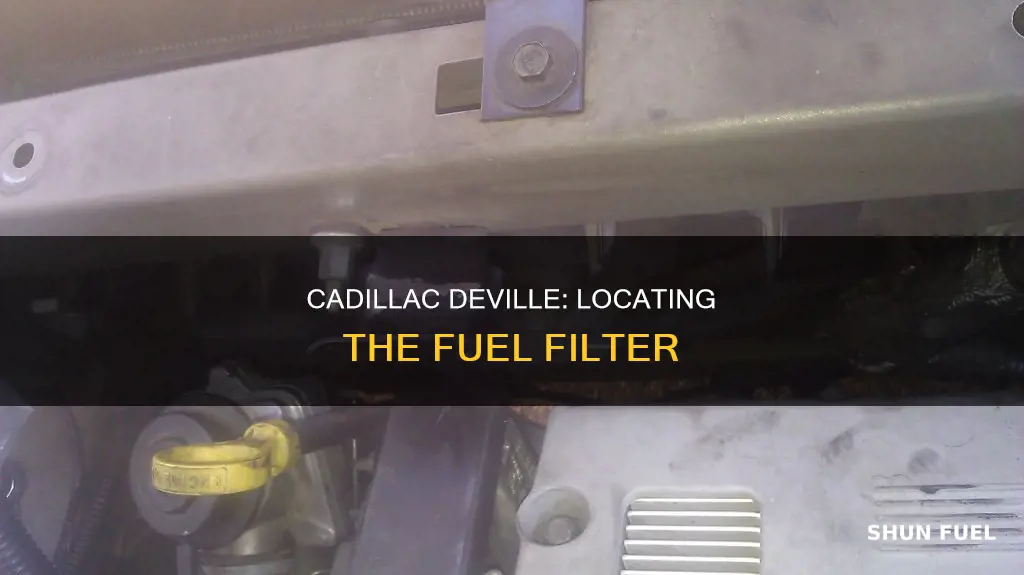 where is fuel filter on 2000 cadillac deville