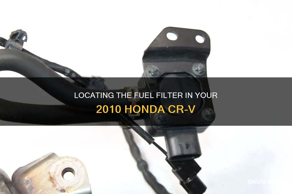 where is fuel filter on 2p10 crv