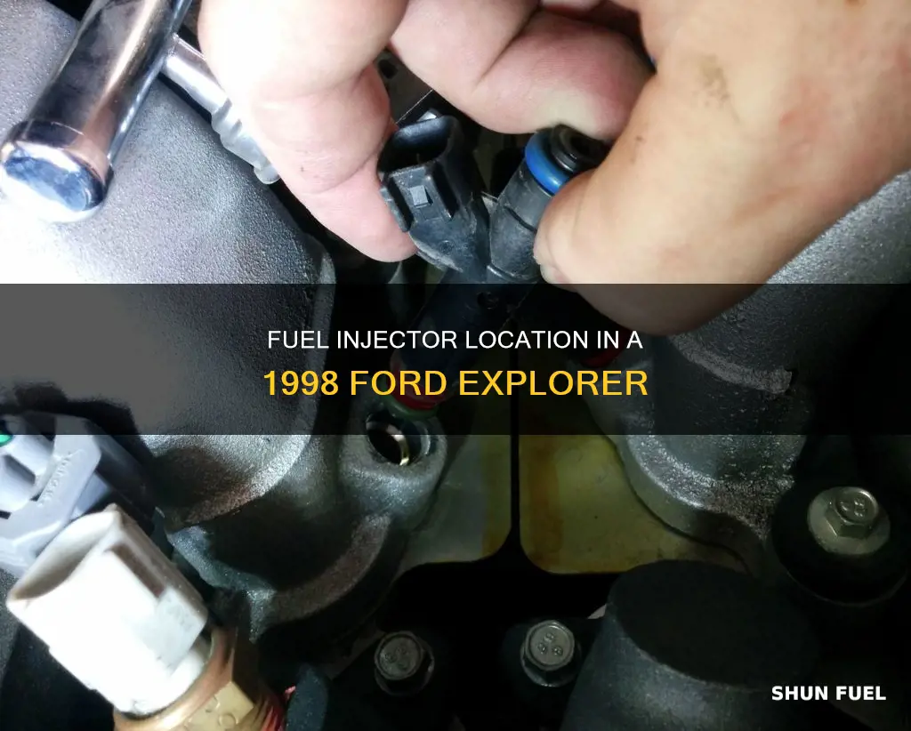 where is fuel injector located in 98 ford explorer