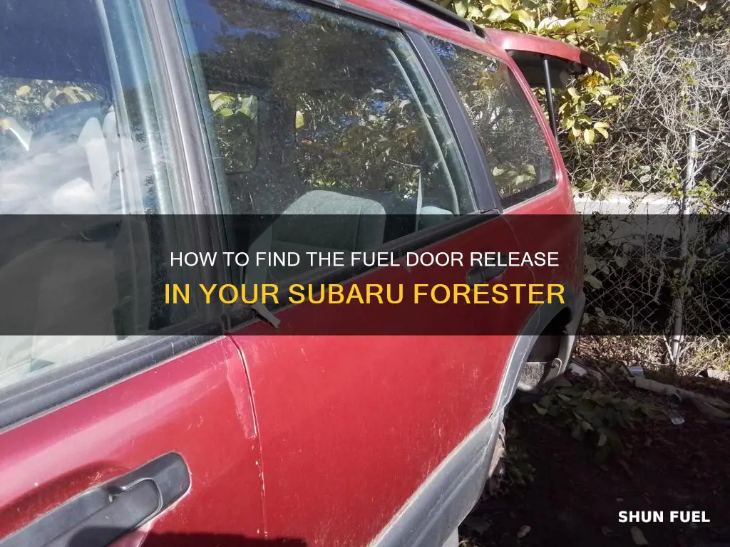 where is fuel tank door release on subaru forester