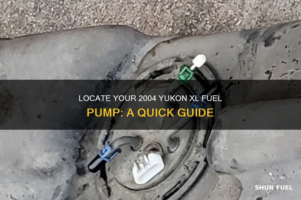 where is my 2004 yukon xl fuel pump located