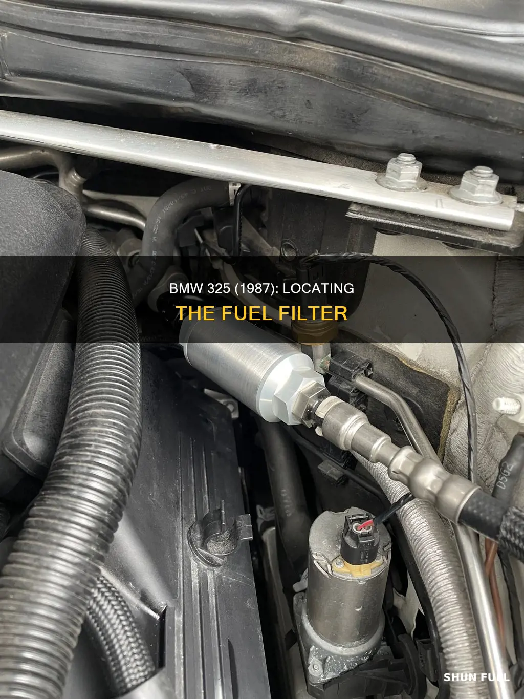 where is the fuel filter bmw 325 1987
