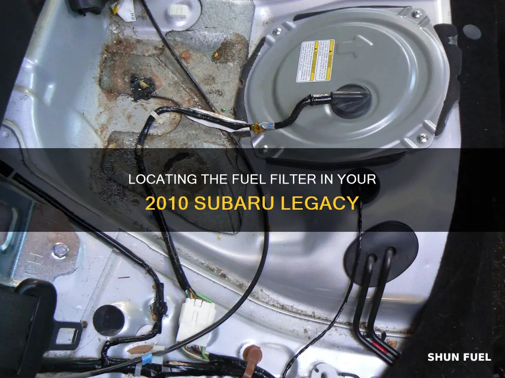 where is the fuel filter in a 2010 subaru legacy