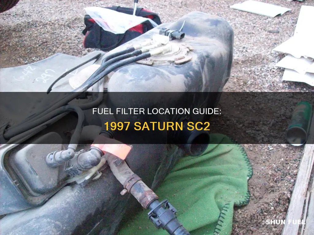 where is the fuel filter on 1997 saturn sc2