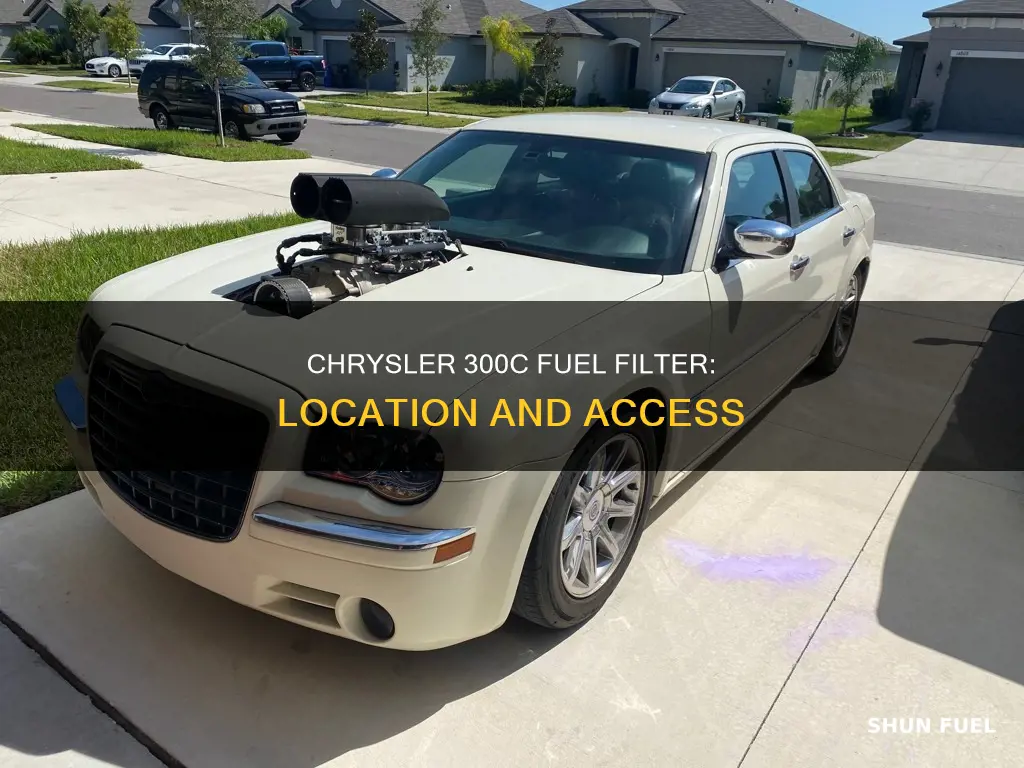 where is the fuel filter on 2005 chrysler 300c