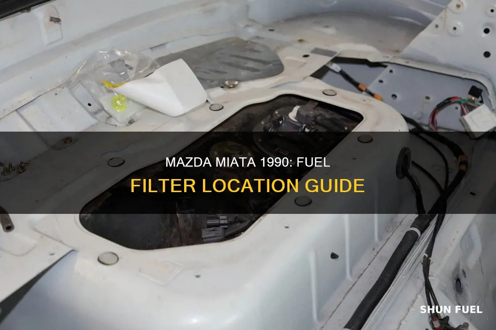 where is the fuel filter on a 1990 mazda miata