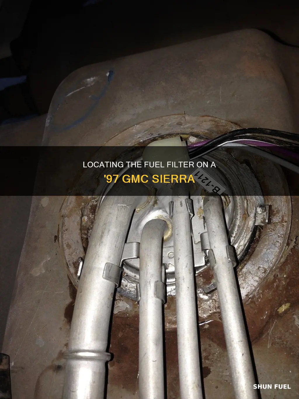 where is the fuel filter on a 1997 gmc sierra