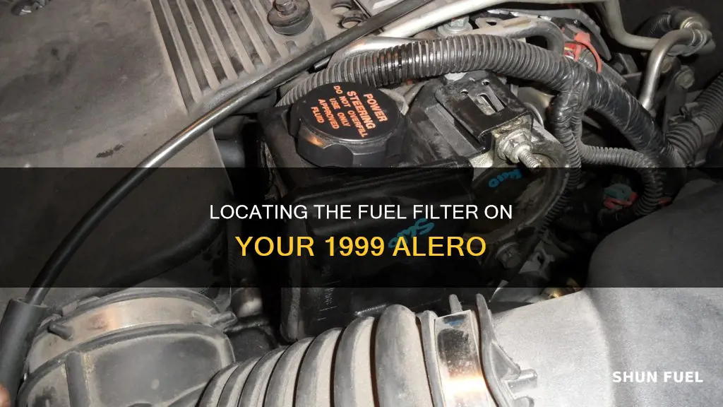 where is the fuel filter on a 1999 alero located