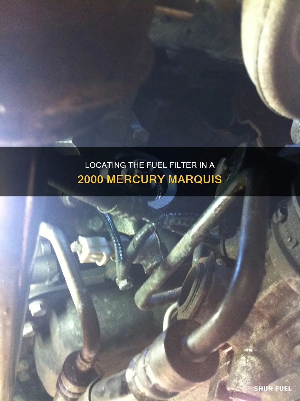 where is the fuel filter on a 2000 mercury marquis