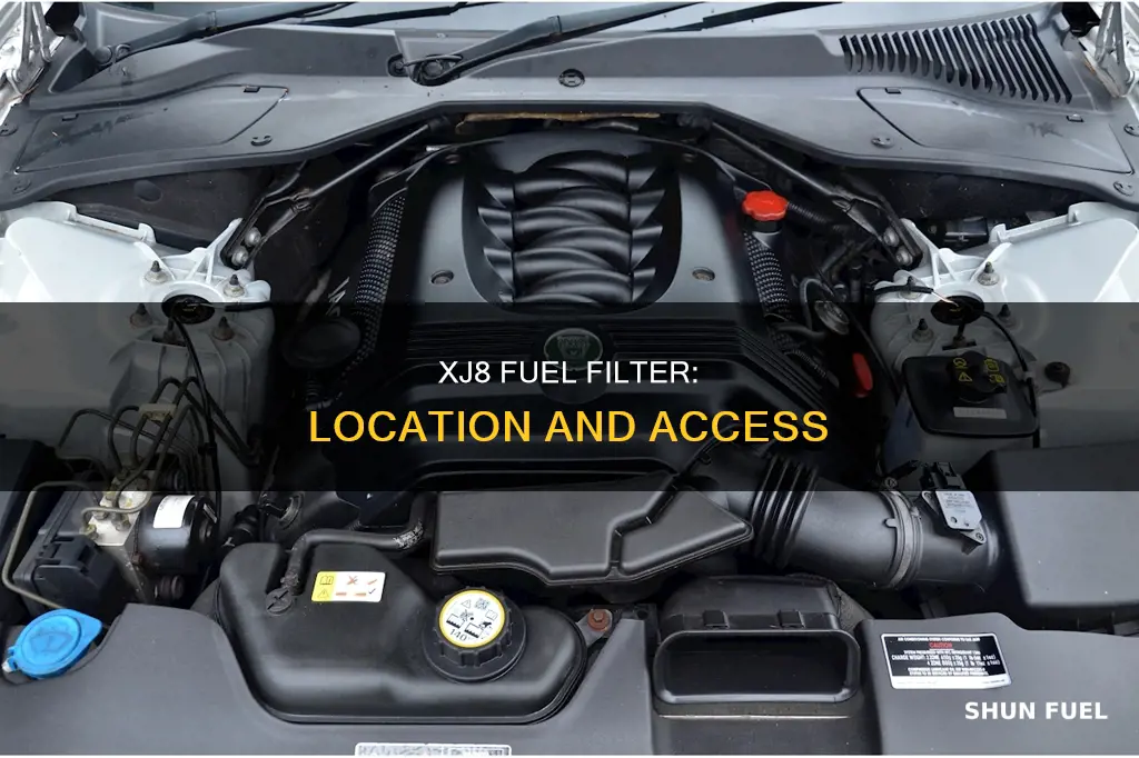 where is the fuel filter on a 2004 xj8