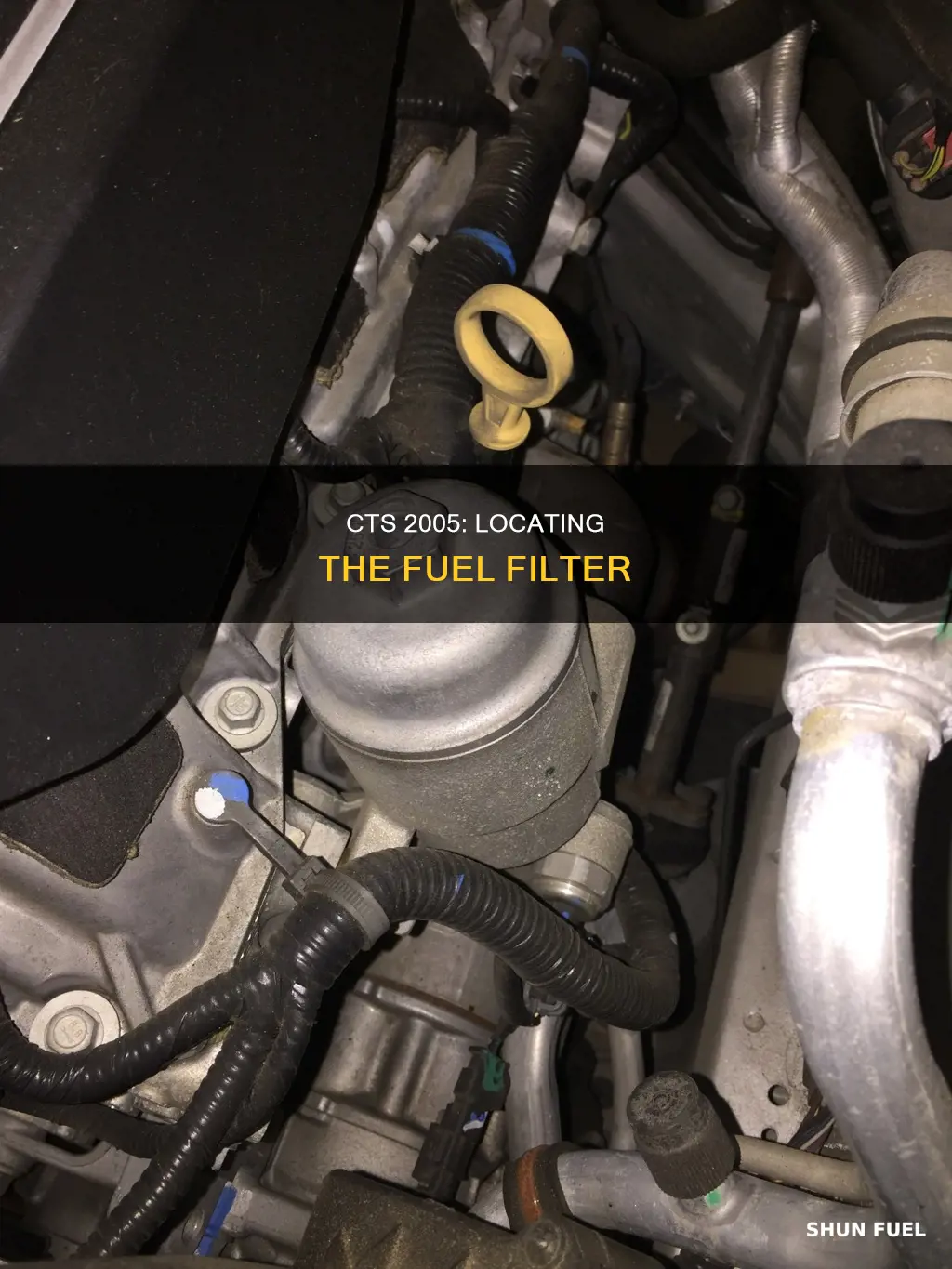 where is the fuel filter on a 2005 cts