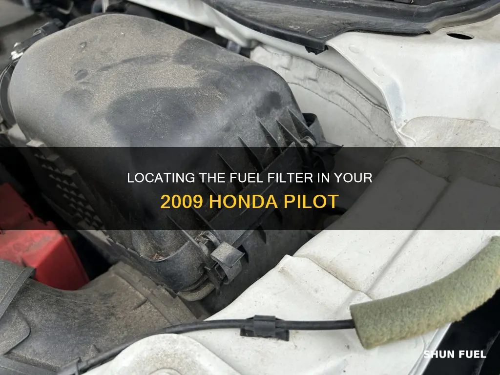 where is the fuel filter on a 2009 honda pilot
