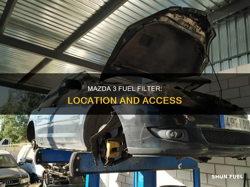 where is the fuel filter on a 2010 mazda 3