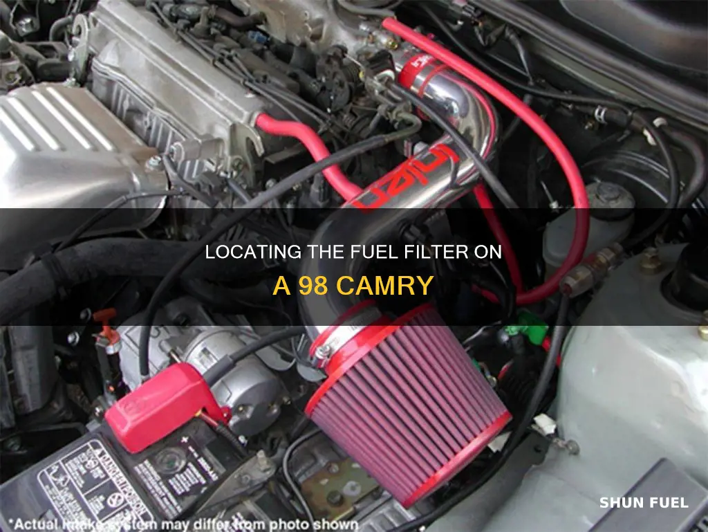 where is the fuel filter on a 98 camery located