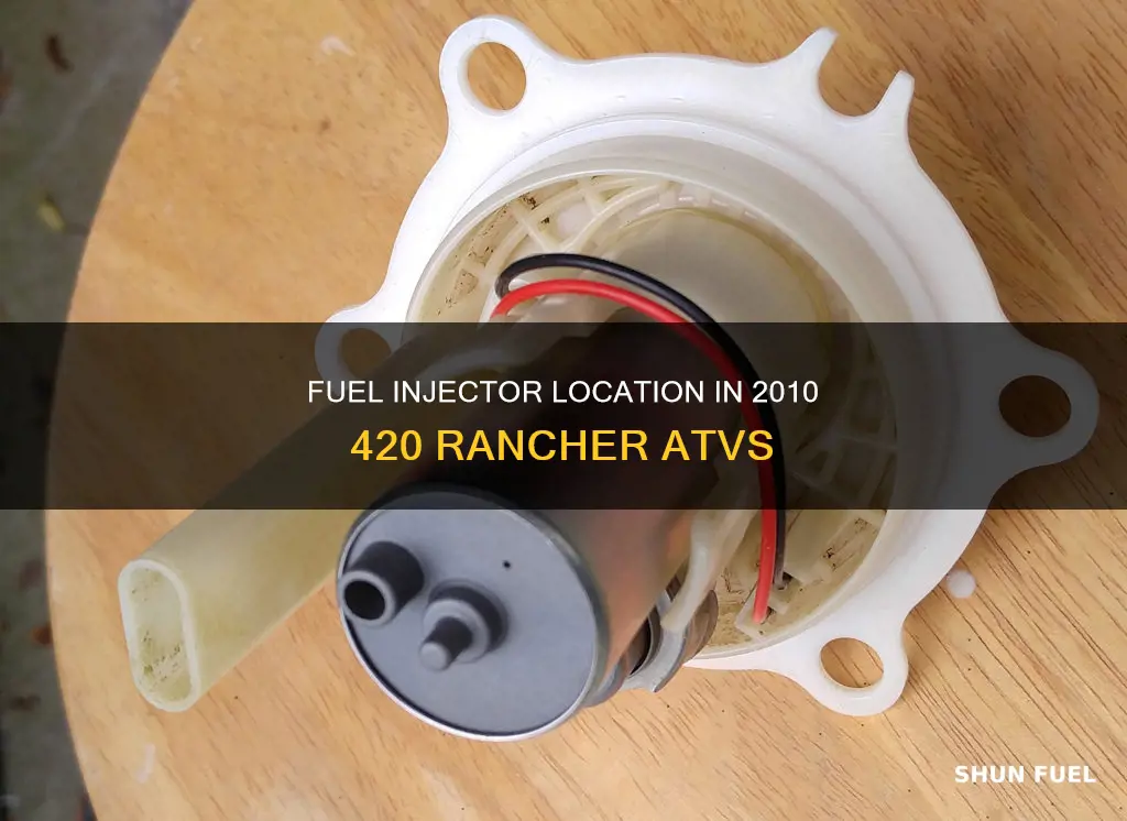 where is the fuel injector located on 2010 420 rancher