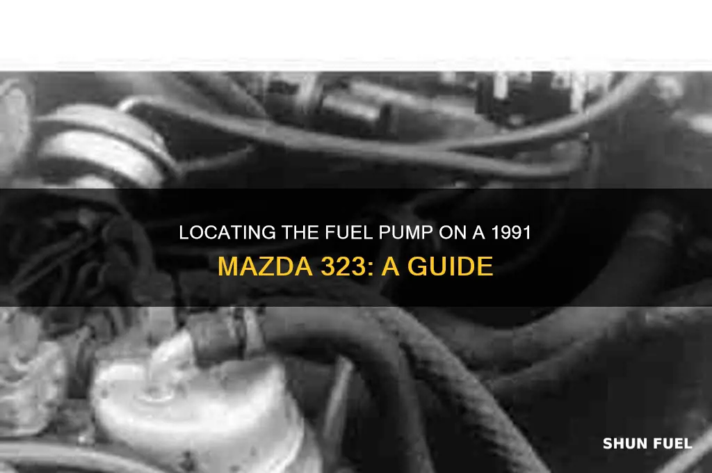 where is the fuel pump on a 1991 mazda 323