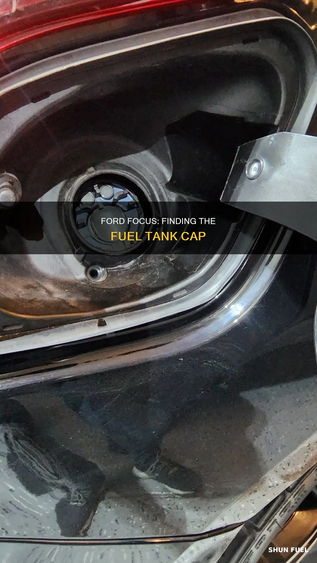 where is the fuel tank cap on ford focus